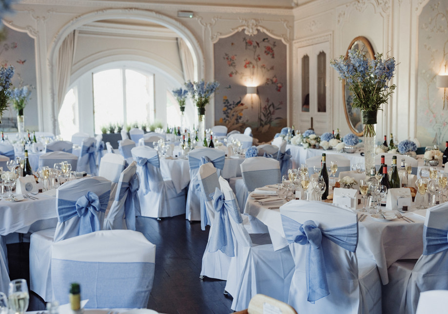 Wedding breakfast at 1925 at The Pompadour with blue and white wedding decor